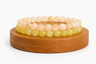 Coffret duo Citrine chauffée issue d’Améthyste et Jade Citron teinté, avec deux bracelets jaunes.